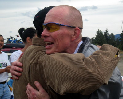 RD Charlie hugs Eric at the finish
