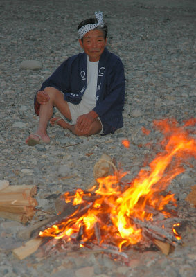 Preparing Fire to light up the fishing boats' torches.