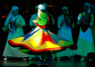 The dancer keeps whirling for an hour accompanied by the drums' beats