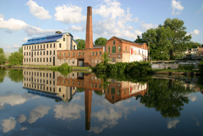 mill with cloud reflection