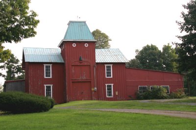red barn with a moustache