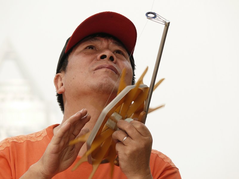 Kite flyer, Shanghai, China, 2007