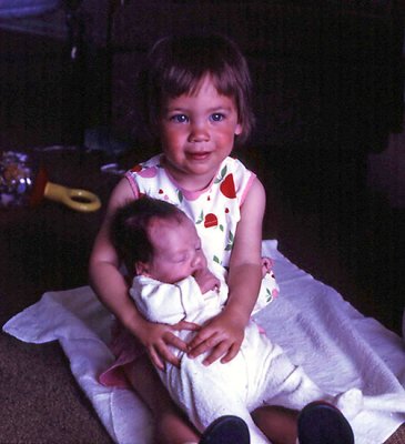 Daughter's Kim holding Debi 1967