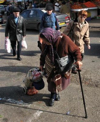 Old Aged Carrying Home Their Bargains At The Market.JPG