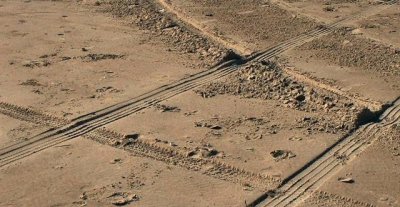 Twin Car Tracks In The Sand.JPG