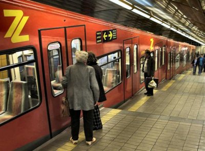 Passengers Waiting For The Subway Doors To Open.JPG