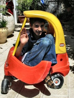 Pushing Into His Baby- Brother Minicar Toy .JPG