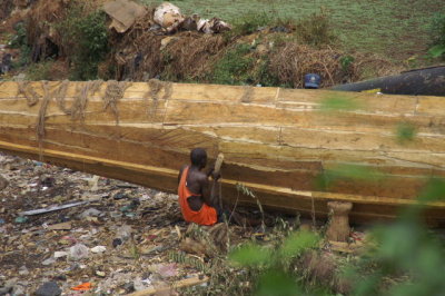 Canoe being built adjacent to the docks