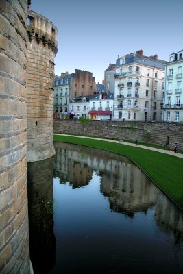 Who knows if Anne , as a child, threw pebbles into the water of the moat?