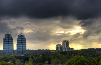 sunset behind the king and queen buildings on a cloudy day