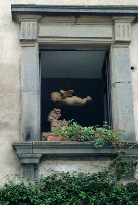 Flying angel in a window