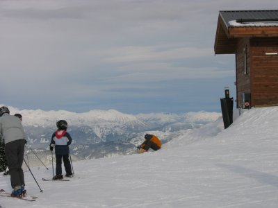 Federico cheking his snowboard.JPG