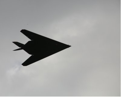 Stealth Fighter over flying Cincinnati