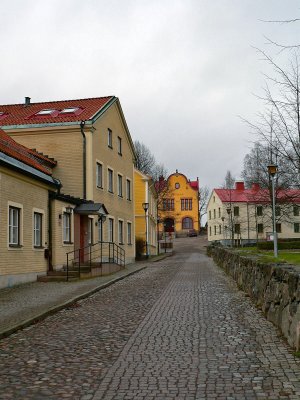 Street with the old school at  the back