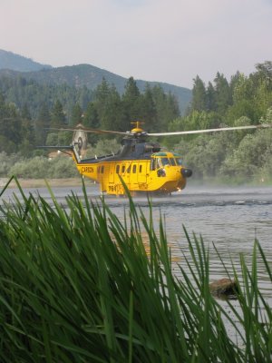 S-61 almost sits on the water as it pumps