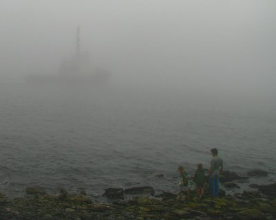 Halifax Fog  View From ShoreThe people on shore show how close that boat actually is