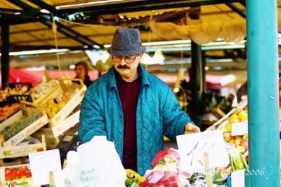 Grocer in Rialto market, Venice