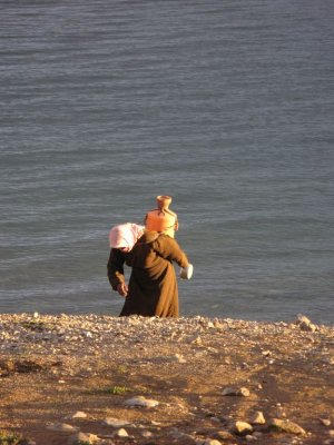 A Woman carrying Water from the Lake
