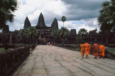 Monks approaching Angkor Wat