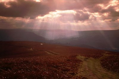 Sun rays bursting through cloud, Monmouthshire