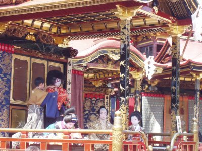 Occasionally, helpers would dart out from the interior of the floats and help the kids adjust their cumbersome kabuki costumes.
