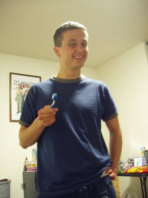 Taking a random picture of Josh brushing his teeth after deciding I hadn't been taking enough pictures.