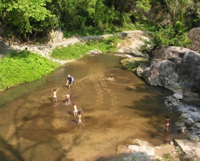 Thai Kids Playing In The River.jpg