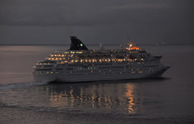 Norwegian Majesty silently departing at night