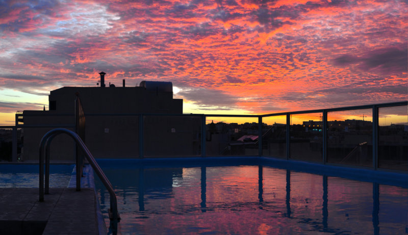 swimming pool sunset
