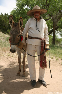 Man with burro