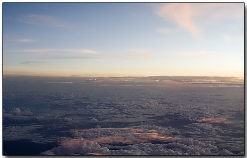 Window above the clouds - Singapore to New Delhi