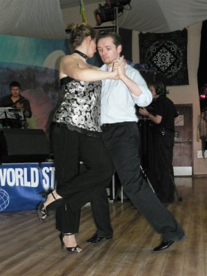 With accompanying dancers