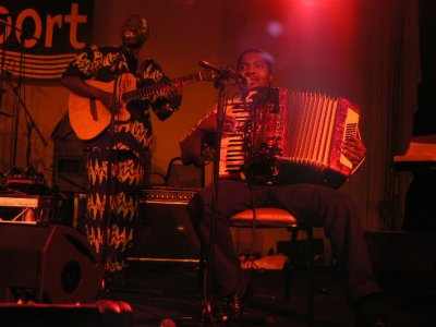 with his band from Angola