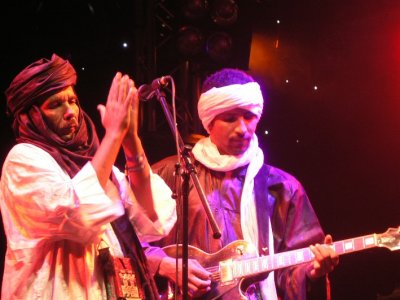 and playing their inimitable Toureg desert blues