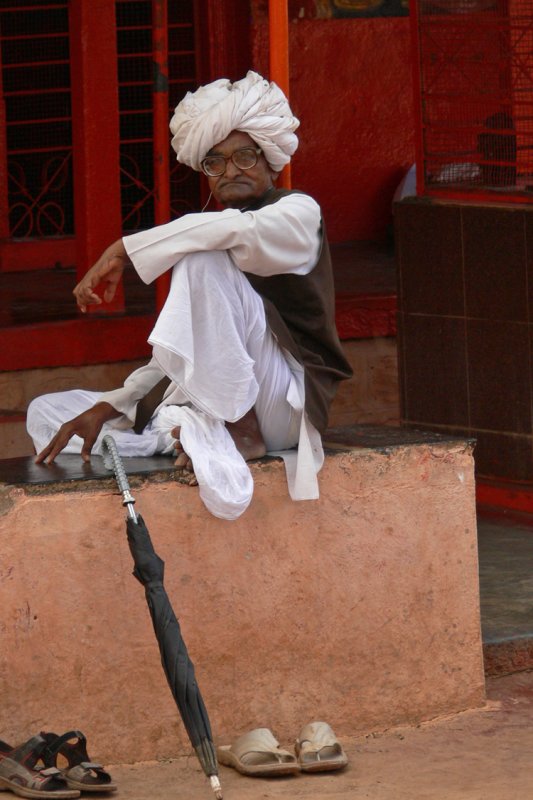 Man with umbrella Badami