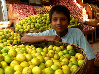 Boy with limes