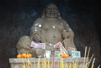 happy (and wealthy) buddha