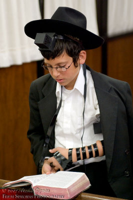 Yisroel Yosef Putting on Tefillin for the first time