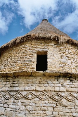 Remark the cone -shaped thatch