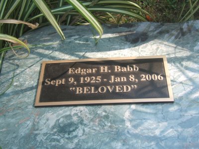 Marker on Memorial Bench Near Grave