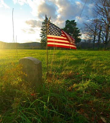 A Lone Civil War Tombstone in an Open Field