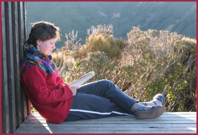 Louise relaxing at Pouakai Hut.