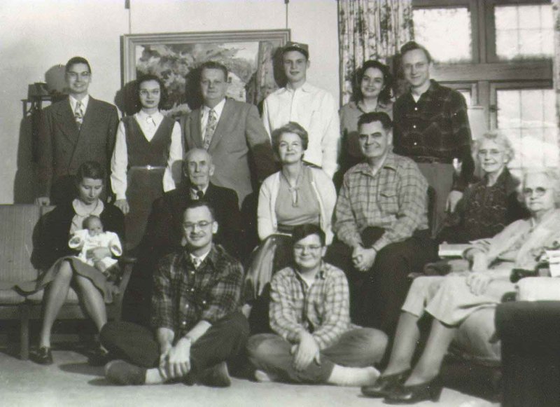 Dads family (1945).  Tim is seated with legs crossed front and center.
