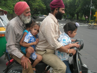 (Sikhs are exempt from the helmet laws)