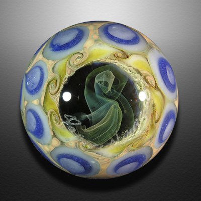 A fumed S murrine cane is featured here, running off into the depths.  A large fumed S adorns the backside.