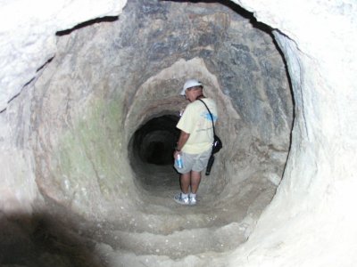 Here's Bob playing around in another hole.  Our tour book said not to attempt the perilous stairs.