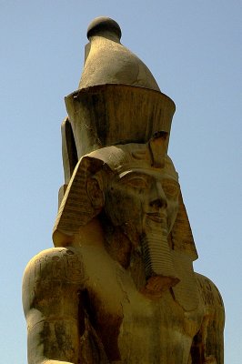 hieroglyphs of Ramses II on the upper right arm