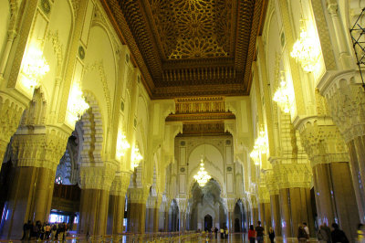 the prayer hall - covers 20,000 sq m and accommodates upto 25,000 worshippers.  It is equipped with a movable roof