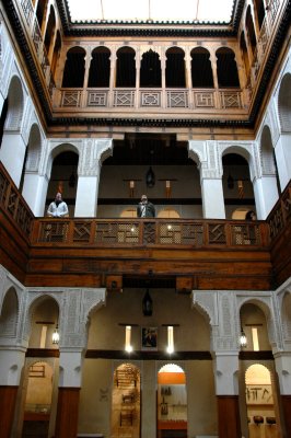 a caravanserai for travelling merchants who stored and sold their goods below