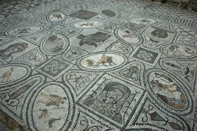a mosaic with vignettes of most of the Labors of Hercules (House of the Labours of Hercules)